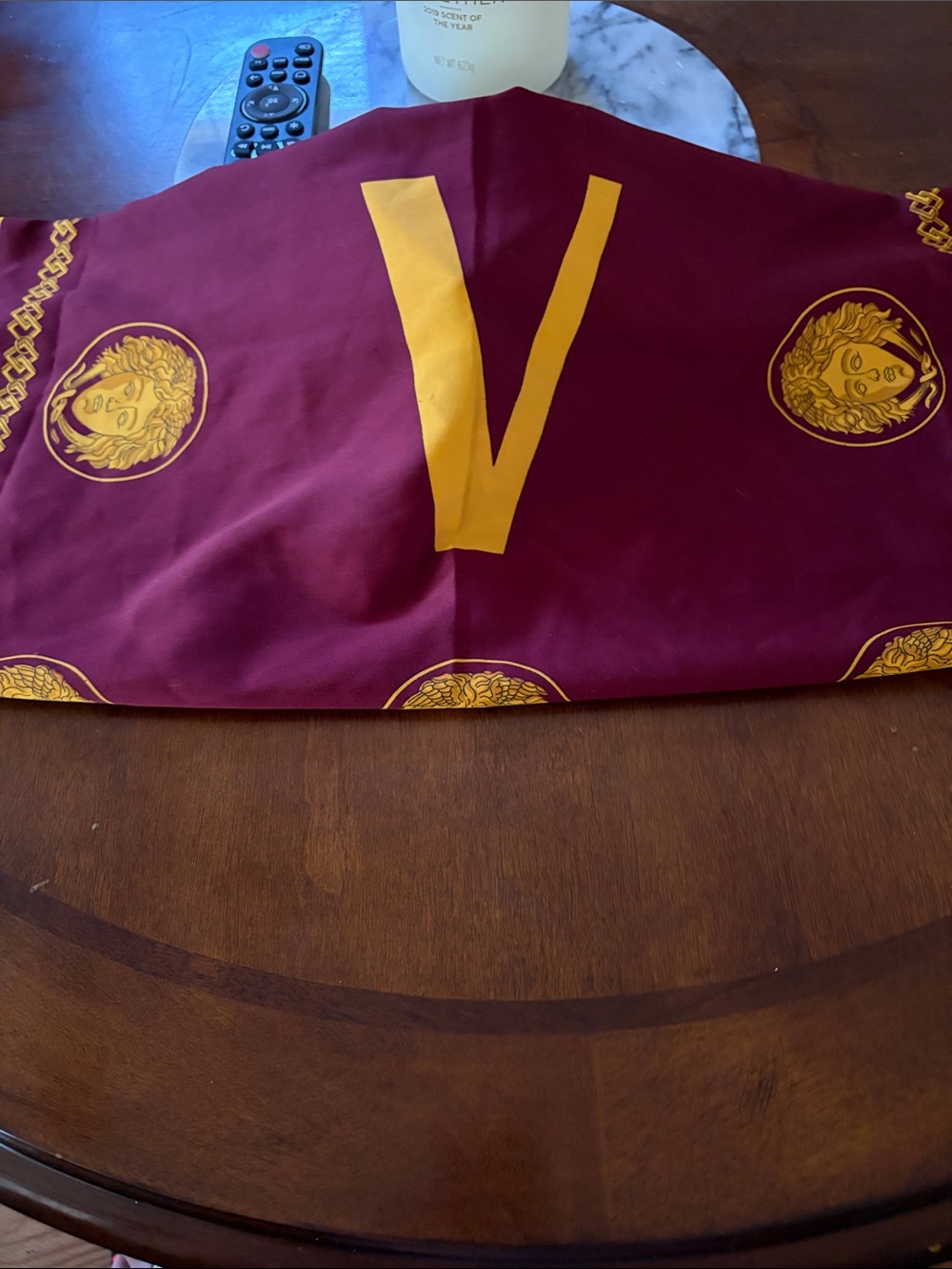 Maroon and Gold head wrap Versace